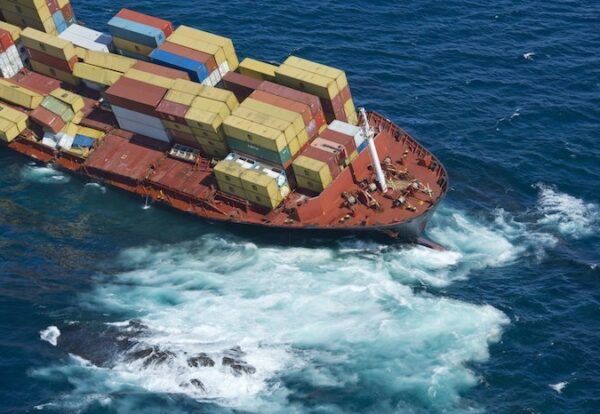 Grounded ship Rena on the Astrolabe reef